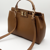 Brown faux leather handbag with gold trim - svnx