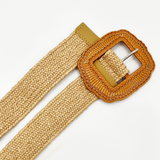 Woven belt with decorative buckle