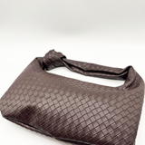 SVNX Woven PU leather grab bag with knotted strap detail in dark oak