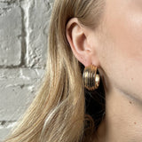 Chunky hoop earrings in gold with inprinted texture