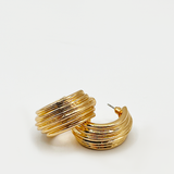 Chunky hoop earrings in gold with inprinted texture