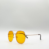 Oversized rounded aviator style sunglasses with yellow lenses